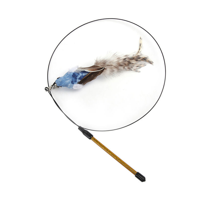 Close-up of the replaceable blue-brown feather teaser attachment on the Aevvon cat wand toy